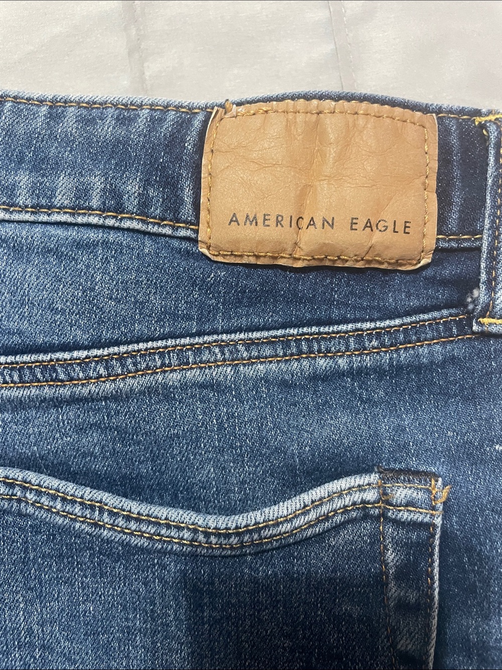 American Eagle Outfitters Dark Blue Denim Jeans with Tan Patch